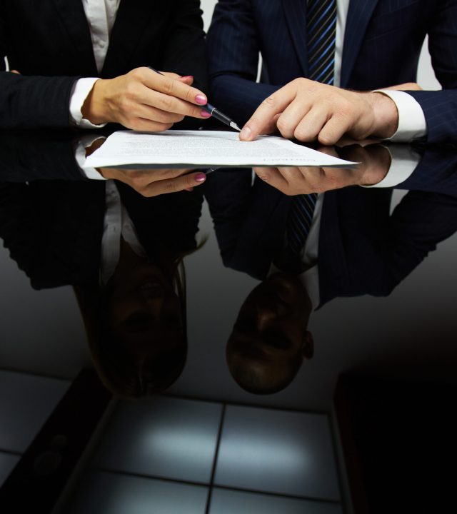 Image of human hands during reading contract